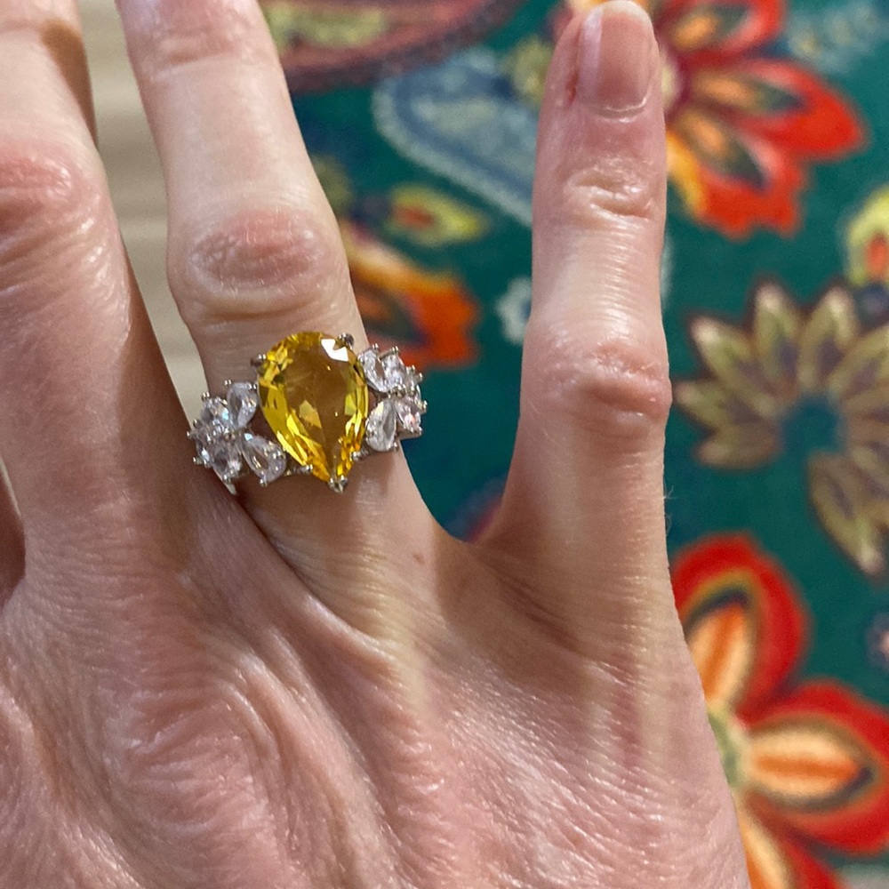 925 stamped silver ring with yellow stone.  Beautiful.  New. Size 6
